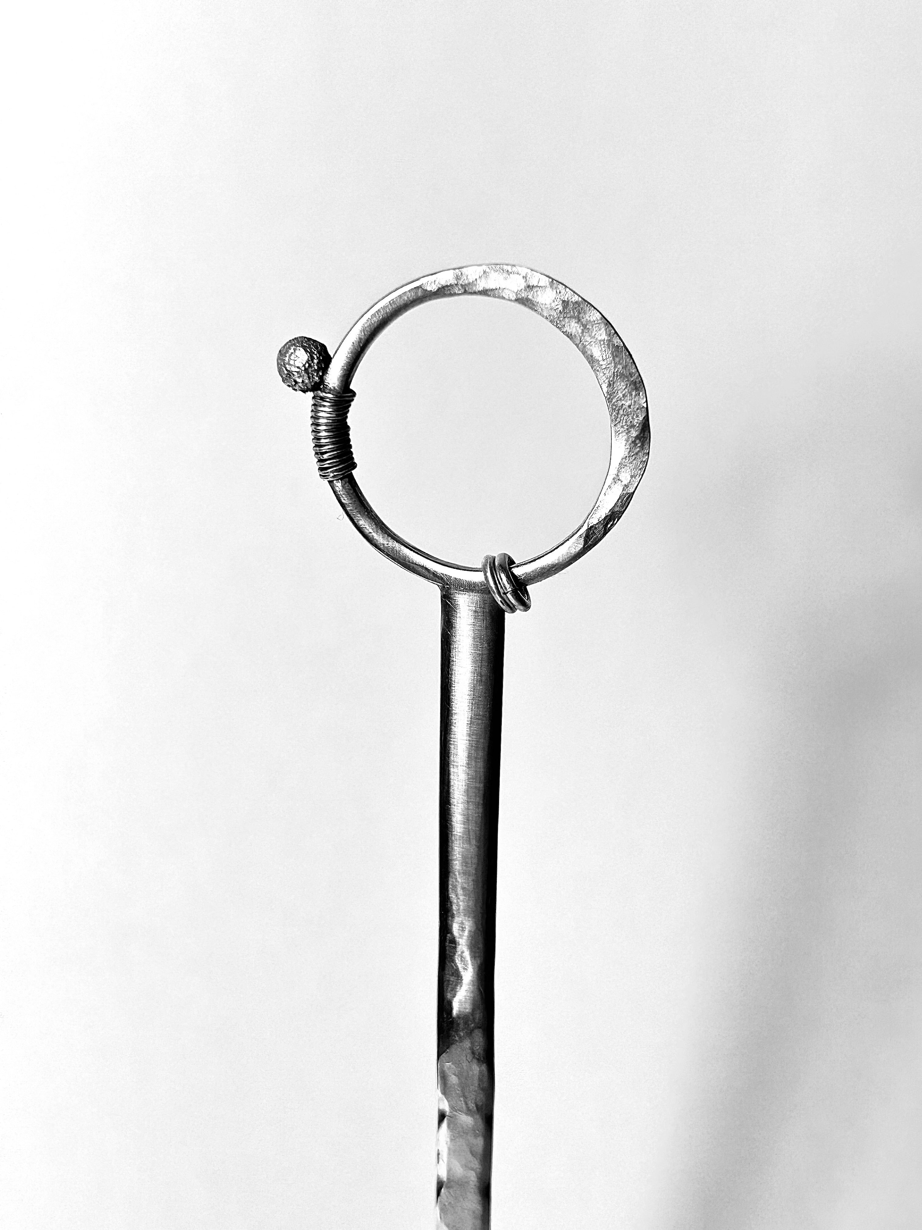 Héphaïstos Pique à cheveux